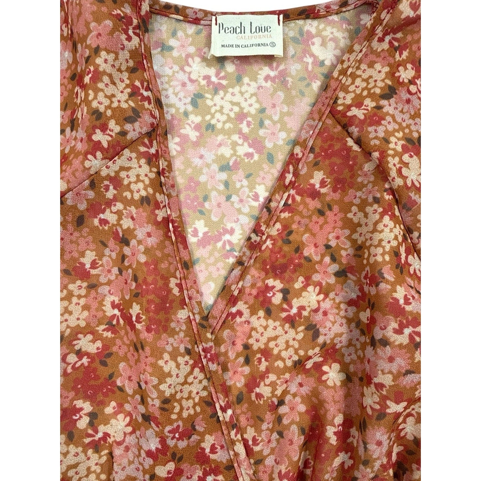 Peach Love California Floral Smocked Waist Bell Sleeve Wrap Blouse