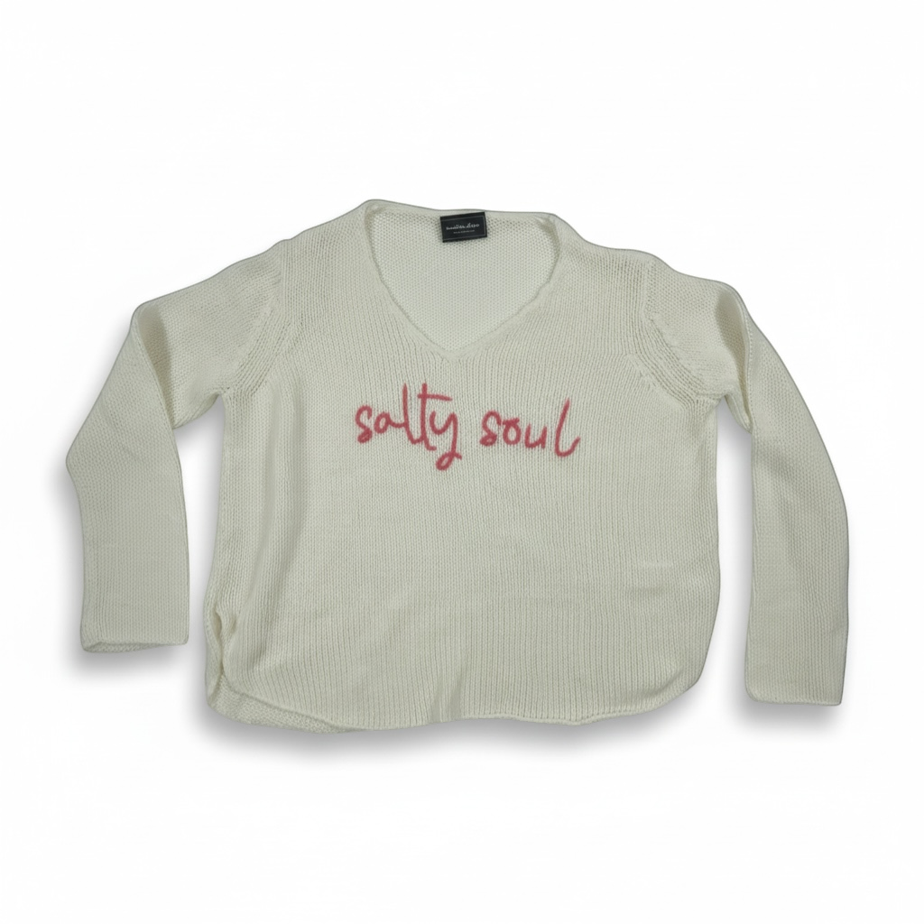 Bougiere Boutique cream v-neck sweater with 'salty soul' embroidered in pink. Cotton-acrylic blend.