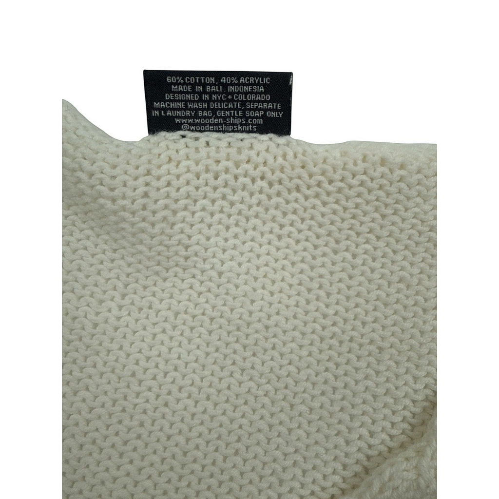 Bougiere Boutique cream cotton-acrylic blend V-neck sweater with pink 'salty soul' embroidery and loose knit.