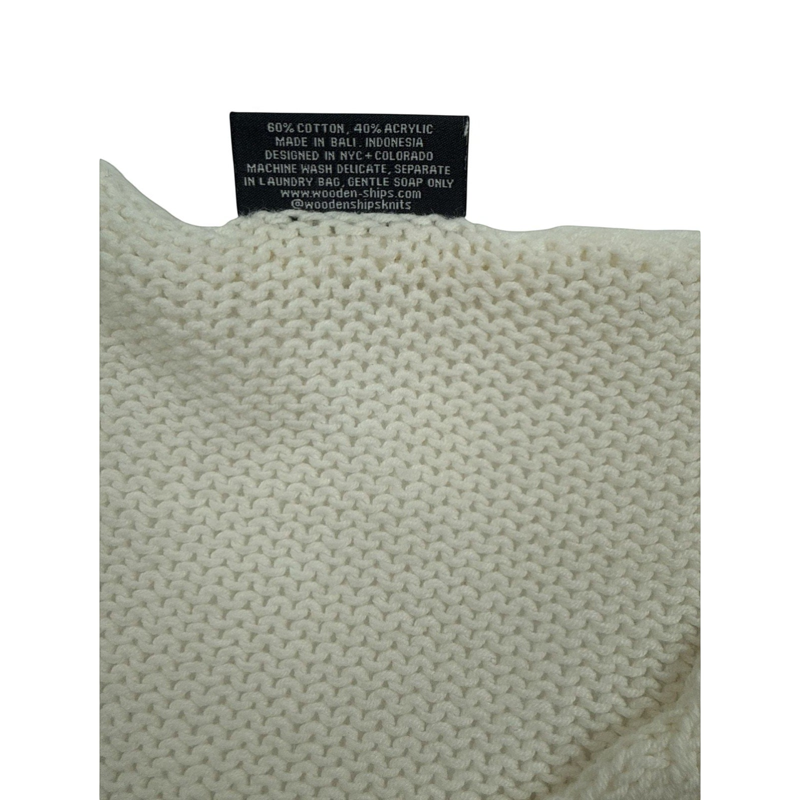 Bougiere Boutique cream cotton-acrylic blend V-neck sweater with pink 'salty soul' embroidery and loose knit.